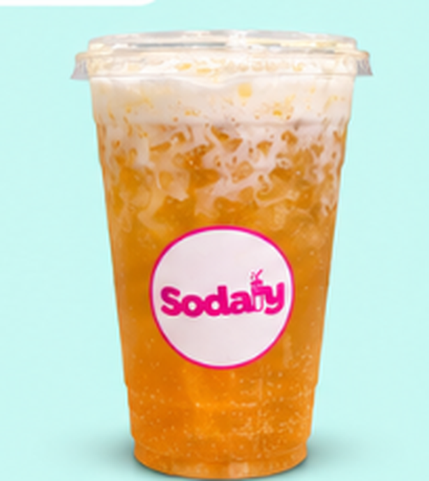 Sodaly Gold Rush — Mountain Dew with pineapple, mango and coconut, topped with Vanilla Cream.