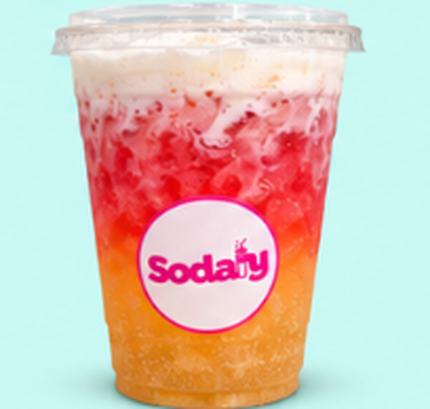 Sodaly Sunset — Starry with strawberry, peach and mango, topped with Vanilla Cream.